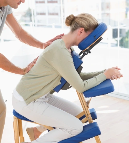 Employee receiving an onsite chair massage