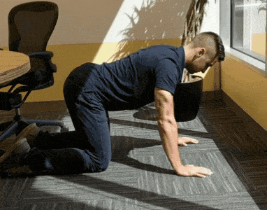 6 Movements To Reduce Back Pain For Office Employees