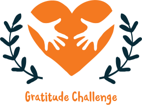Illustration of an orange heart with hands inside, framed by laurel branches, with the text ‘Gratitude Challenge’ below.